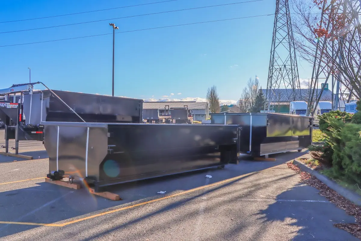 Roll-off dumpster ready for waste disposal at job site for 3 Yard Dumpster Rental in Tahlequah